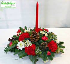 Round christmas centerpiece with candle 