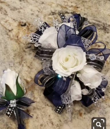 Royalty wrict corsage and boutonniere