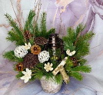 Rustic planter with lantern Christmas arrangement
