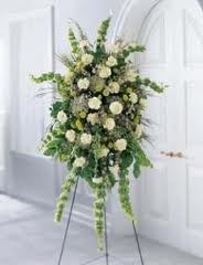 SS 5- Standing spray of mixed flowers Flowers and colors may vary