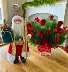 Santa with Gifts Bag & Sleigh Rides Floral Arrangement