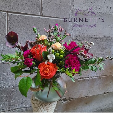 Saturnine Sunset Vase Arrangement in Kelowna, BC | Burnett's Florist Saturnine Sunset Vase Arrangement in Kelowna, BC | Burnett's Florist