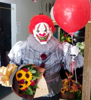 Scary Clown Delivers Flowers Sunflower & Rose Hand Bouquet 