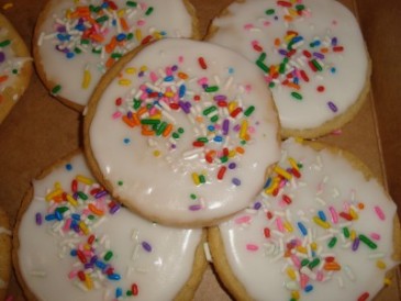 Dozen iced Sugar cookies with sprinkles! Order need 30 hour notice for delivery