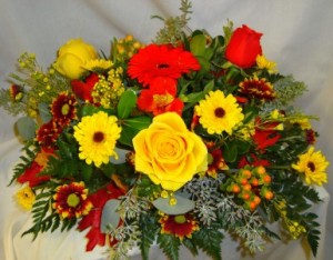 Centerpiece for fall! Seasonal flowers and colors. 