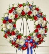 Serene Blessings Red, White & Blue Standing Wreath sympathy flowers