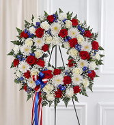 Serene Blessings™ Standing Wreath- Red, White & Bl funeral spray