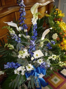 Shades of Blue Blue and Wht Funeral Spray