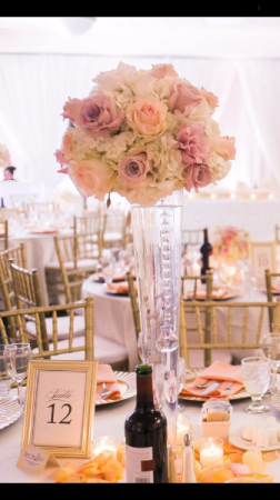 Shades of blush and cream colored wedding topper Wedding centerpieces