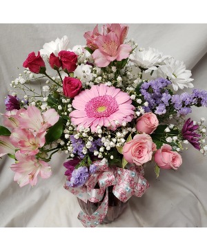 Shades of pinks arrangement...flowers may be  Different According to stock. 