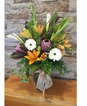 Sheer elegance Tropical elegant flowers in a tall vase