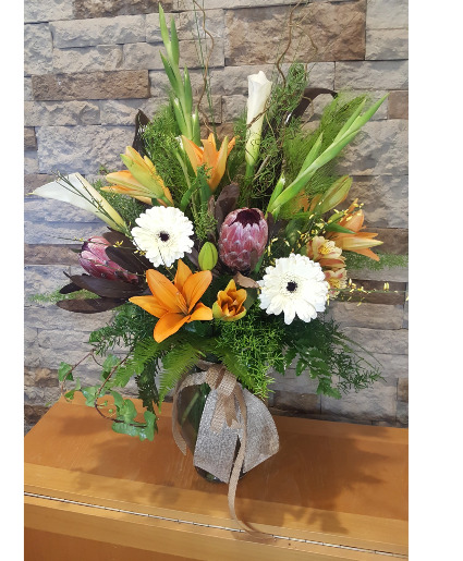 Sheer elegance Tropical elegant flowers in a tall vase