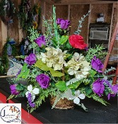 Silk basket arrangement with 1 red rose 