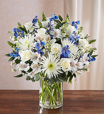 Sincerest Sorrow™ Blue & White Vase arrangement in Orlando, FL | Artistic East Orlando Florist