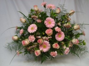 ALWAYS IN MY HEART TRIBUTE ARRANGEMENT Shades of pinks...roses, gerbera daisies, altra lillies, etc. 