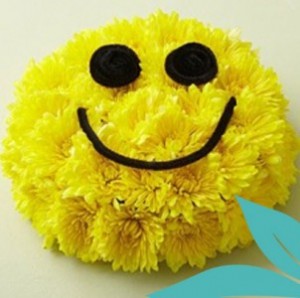 Smiling Emoji Floral Cake