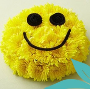 Smiling Emoji Floral Cake