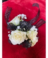 snow queen wristlet with white roses black ribbon