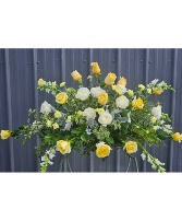 Soft Sunshine Casket Spray Funeral Flowers