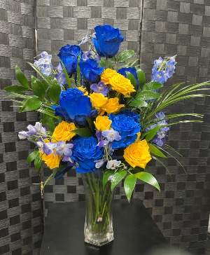 Something Blue Fresh tinted roses with a pop of yellow roses