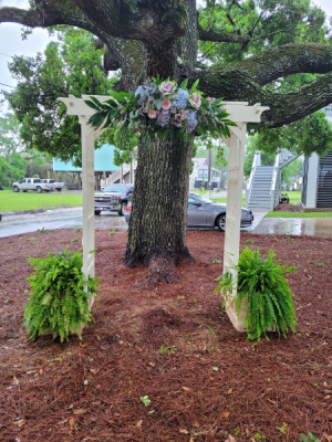 Southern style arch and ferns  