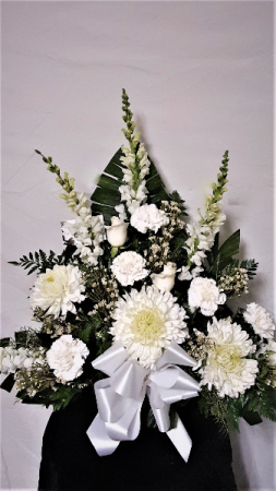 Snow white funeral arrangement