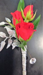 Sparkling Red Bout Boutonniere