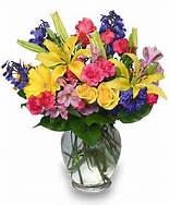 Christina’s spring fun mixed floral arrangement