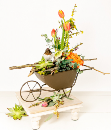 Spring in a barrow Custom arrangement