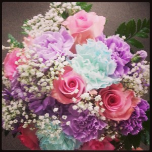 wedding arrangments round soft colors in blues lavenders and whites