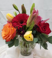 Spring Sangria Mixed vase of vibrant spring flowers