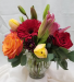 Spring Sangria Mixed vase of vibrant spring flowers