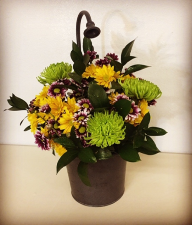 The Dance Floral in a Metal Water Spout Pot