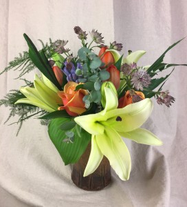 Garden Flowers in Locally Crafted Pottery Pottery & Flowers Arrangement