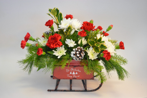 St. Nick's Sleigh Fresh Arrangement in Holland, MI | GLENDA'S LAKEWOOD FLOWERS St. Nick's Sleigh Fresh Arrangement in Holland, MI | GLENDA'S LAKEWOOD FLOWERS