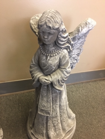 Standing angel funeral