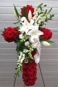 Standing Crosss Red roses and Gerber Daisies,With White Lilies
