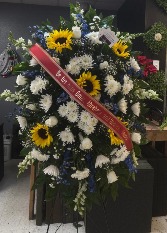 Standing Spray: Blue, white, and sunflowers 