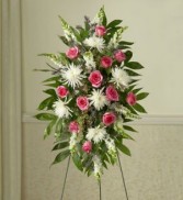STANDING SPRAY WITH ROSES Traditionally sant to funeral home by family members or friends 