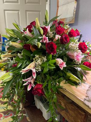 Stargazer lilies and Roses  Family Casket Spray 