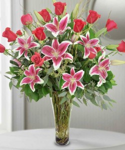 Stargazer Lilies & Roses        vase arrangement