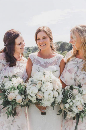 Stunnig bride and brides maids Blush and ivory bouquets
