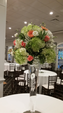 Stunning tall centerpieces Peach and greens
