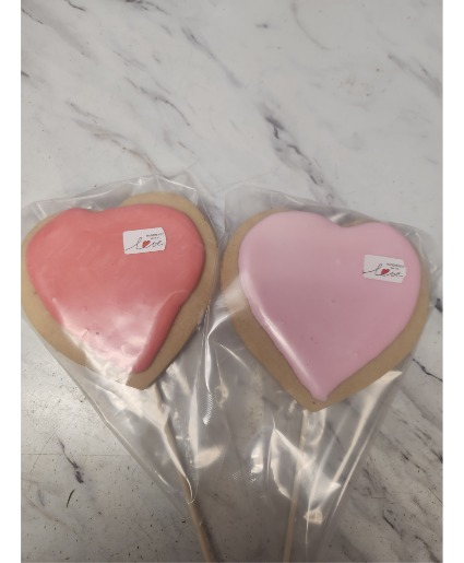 Sugar cookies  Sugar cookies with icing on top ,pink amd red