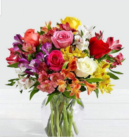 Mixed roses and mixed alstrameria Vase of the freshest ,bright summer flowers