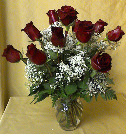 Fall Special deep red roses accented with filler