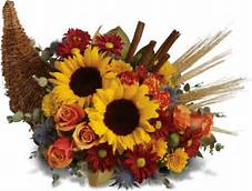 Sun & Cornucopia Beautiful Fall Centerpiece in Monument, CO | Enchanted Florist Sun & Cornucopia Beautiful Fall Centerpiece in Monument, CO | Enchanted Florist