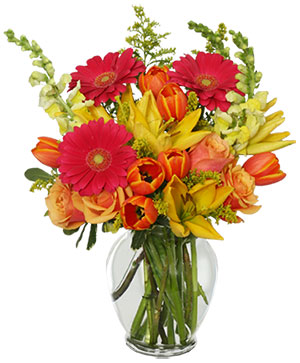 Orange Floral Arrangement On Table by Stocksy Contributor Vicki