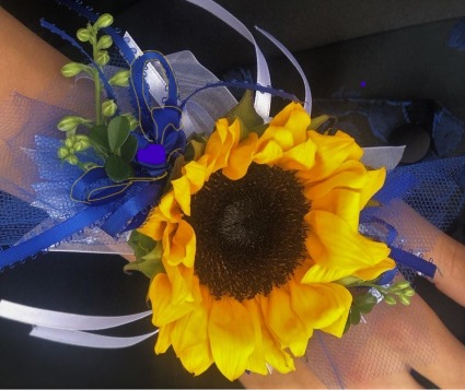 Sunflower Corsage Can be made with other color ribbon. Please call for colors.