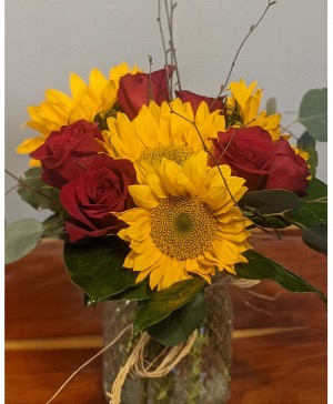 Sunflowers and red roses Summer